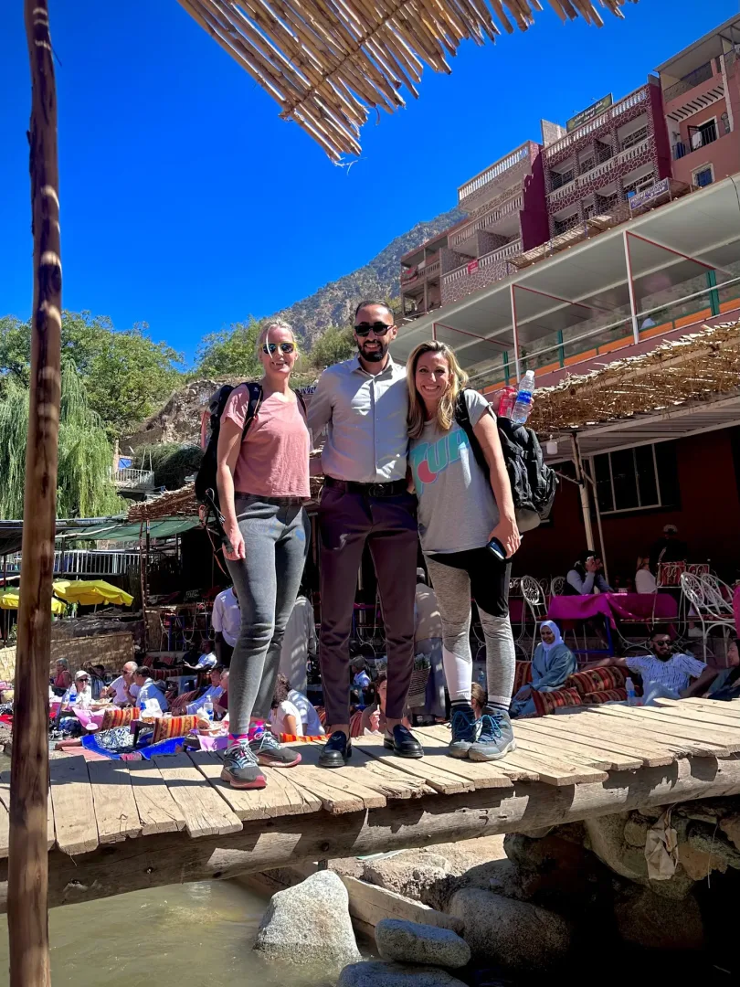 tourists with luggage and guide